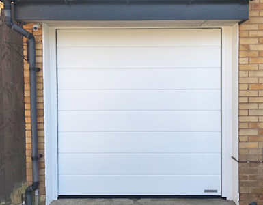 Insulated Sectional Garage Door with woodgrain finish